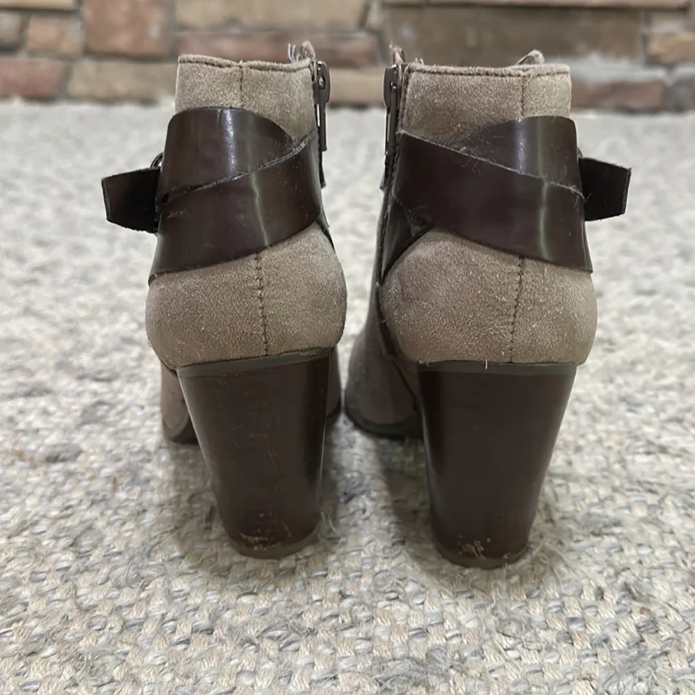 Carlos Santana faux buckle heeled booties
